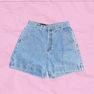 Vintage Action West 90s light wash high waisted denim shorts.